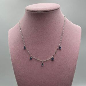 Bomb party lab created blue stone silver tone necklace